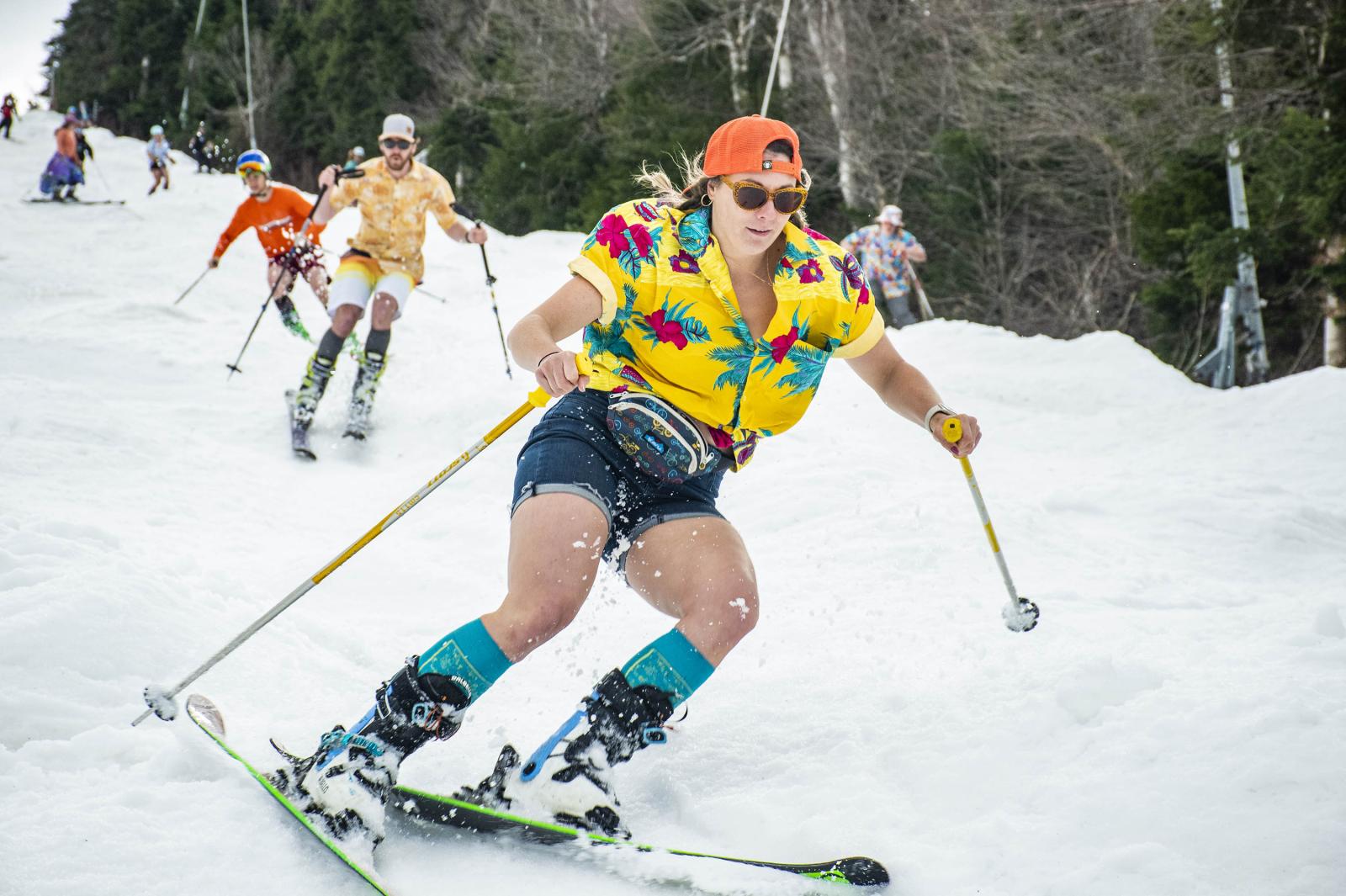 skier in yellow shirt