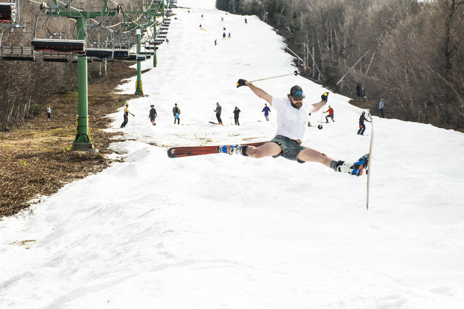 skiing down ski trail