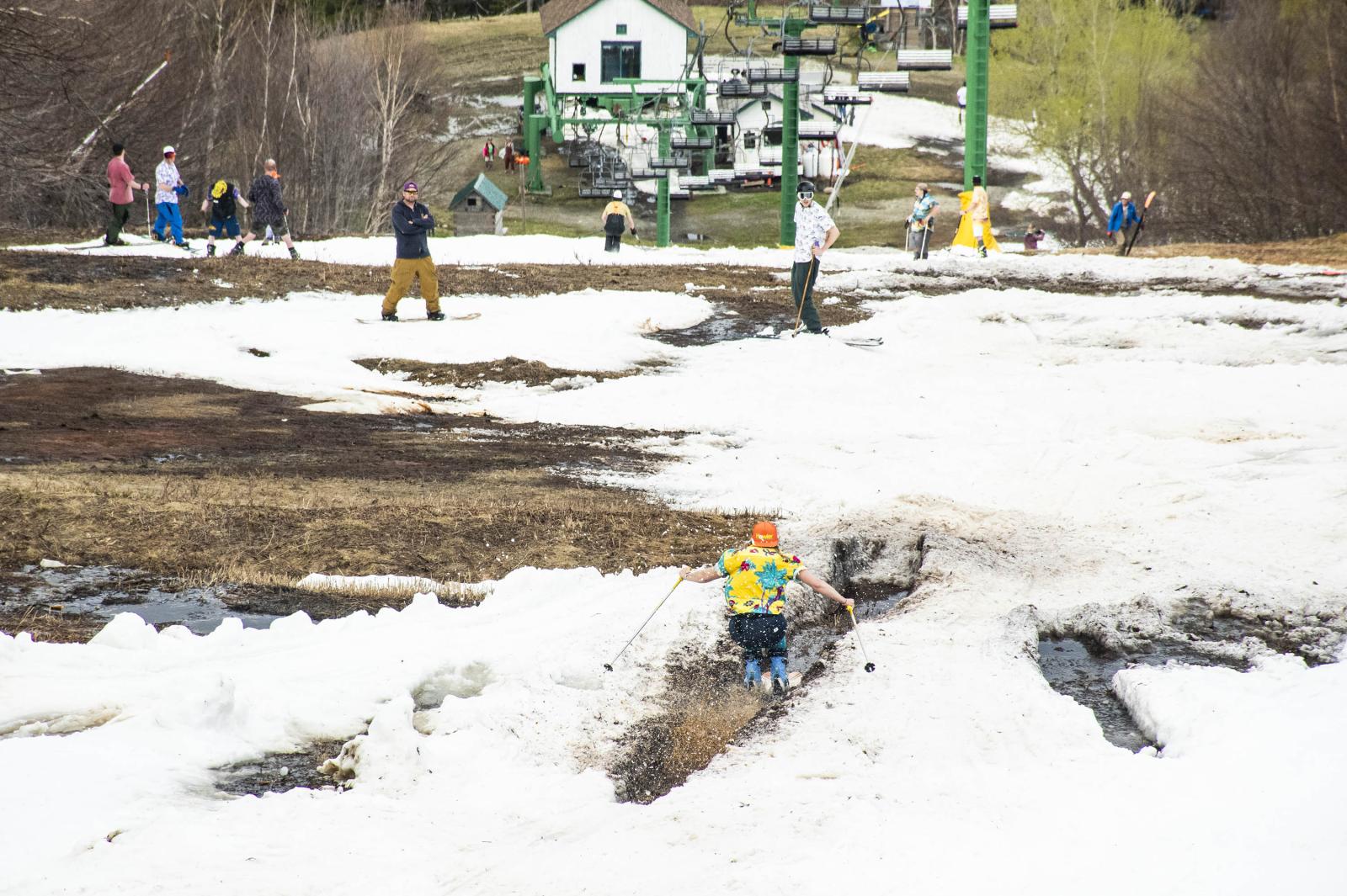 skiing through puddle