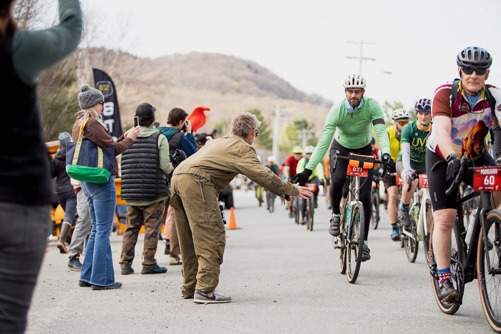 spectators cheering on racers