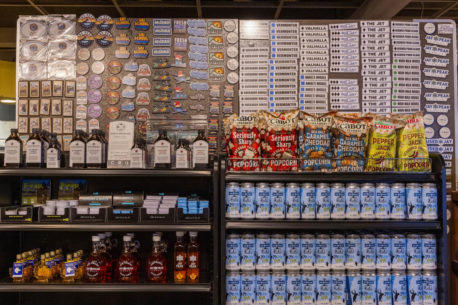 Store shelves stocked with snacks, drinks, and various packaged goods.