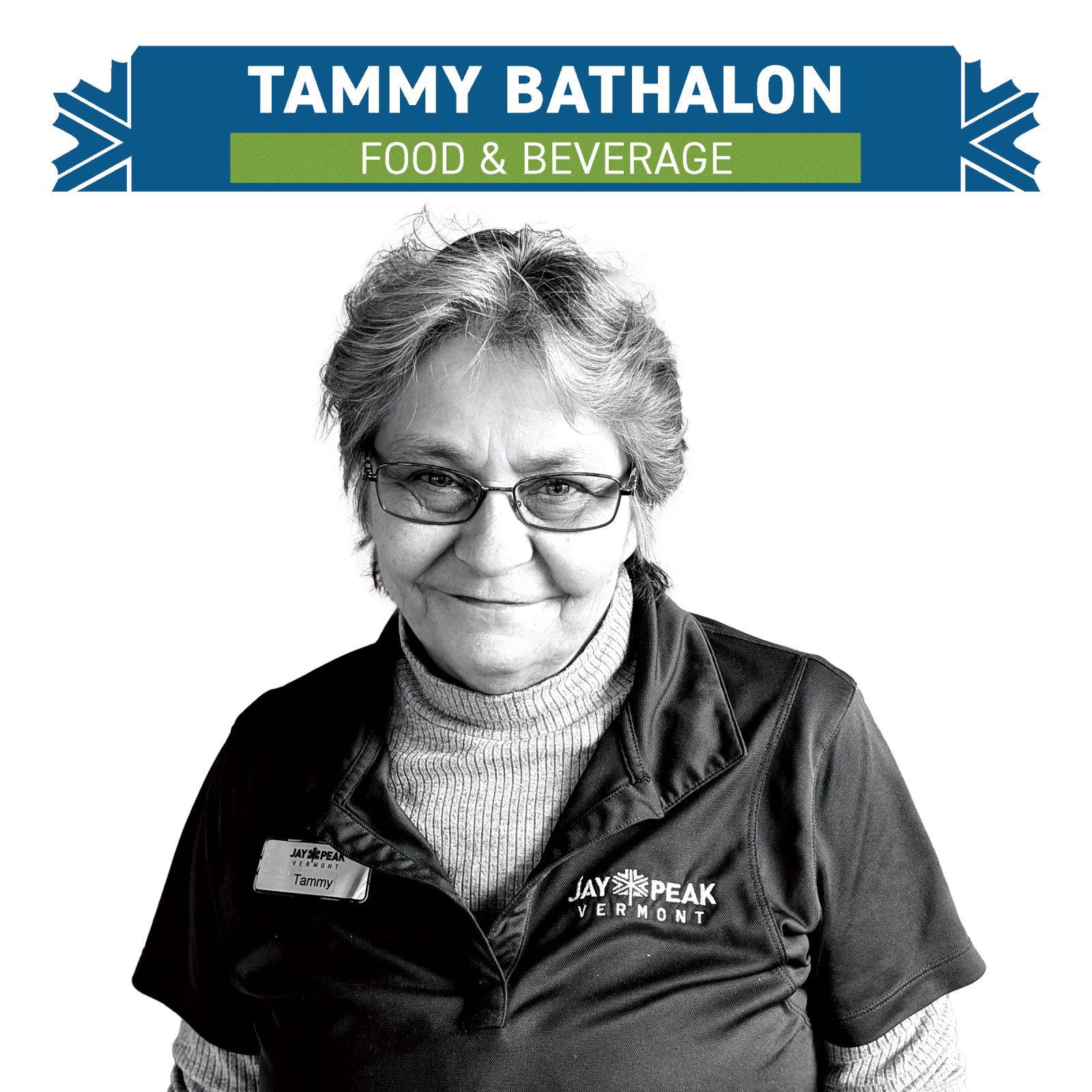 Grayscale portrait of a woman in a polo shirt, looking at the camera.