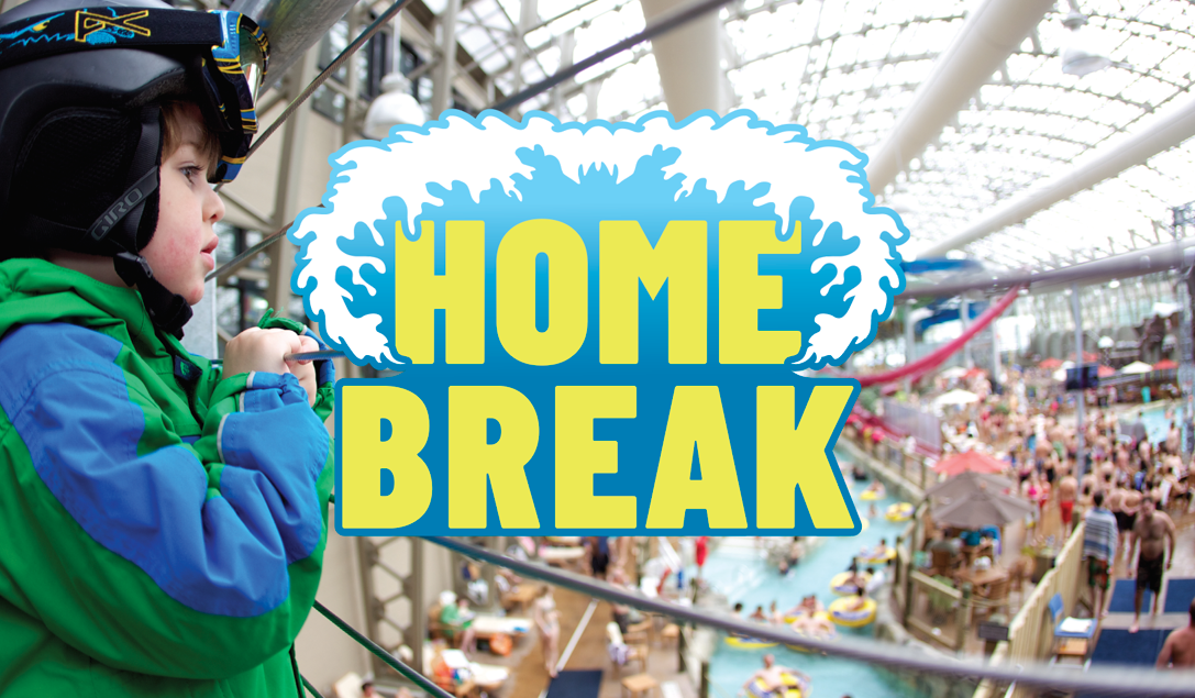 Child in helmet at indoor water park, large logo text "Home Break."