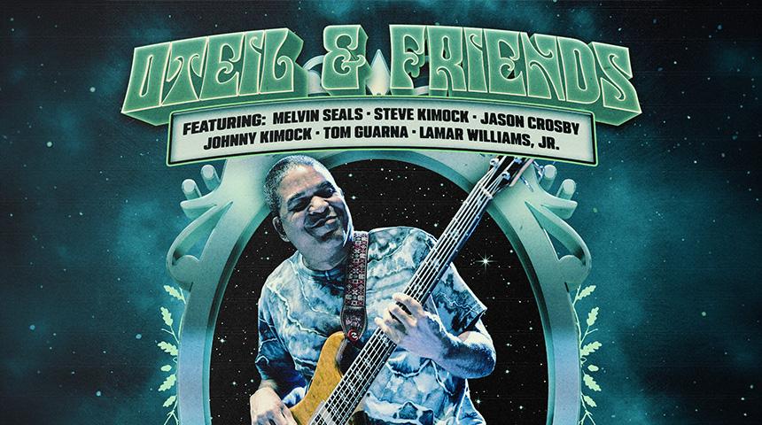 Musician playing bass guitar surrounded by blue and green cosmic design.