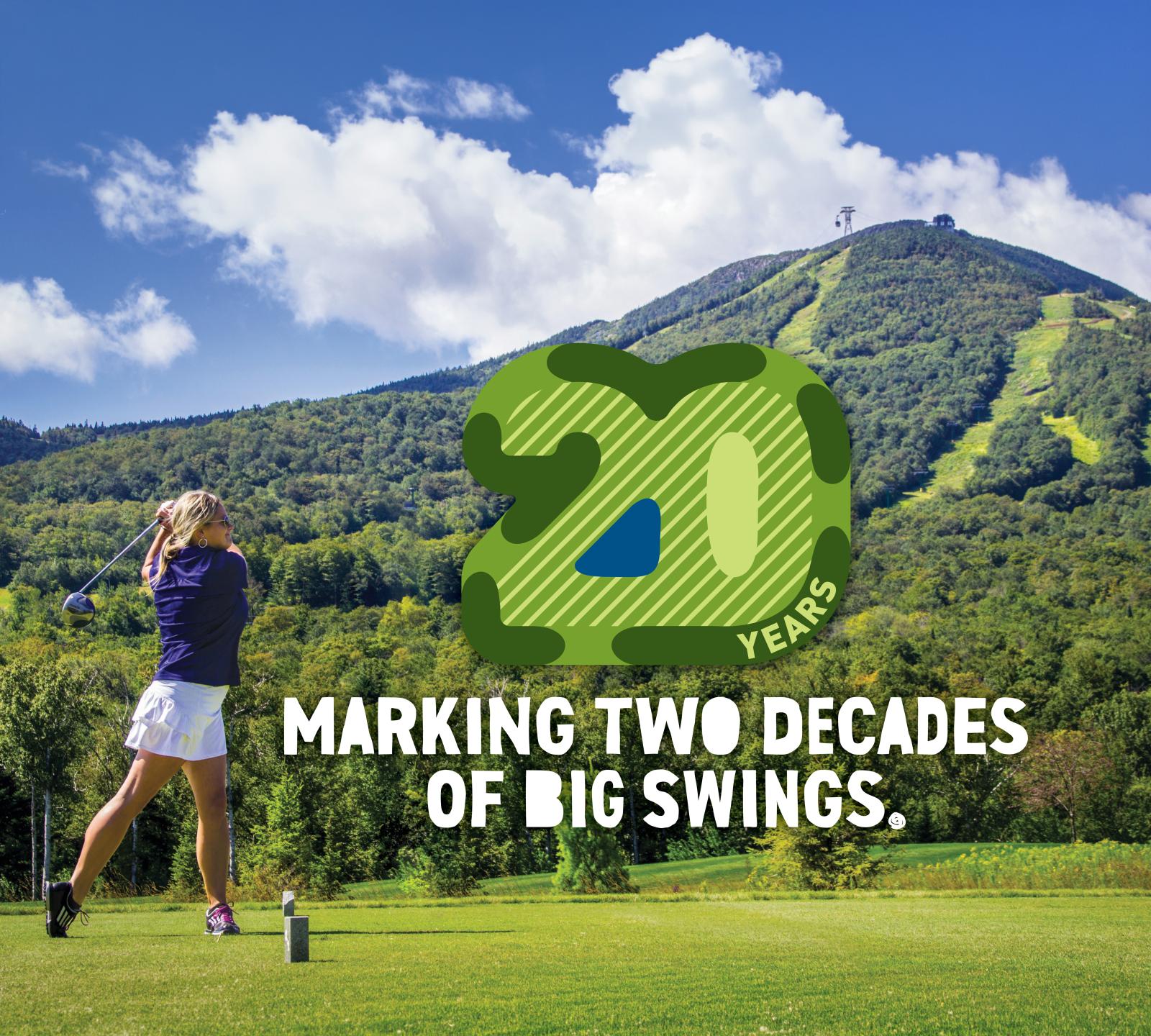 Golfer swings on a scenic course with a lush mountain backdrop.