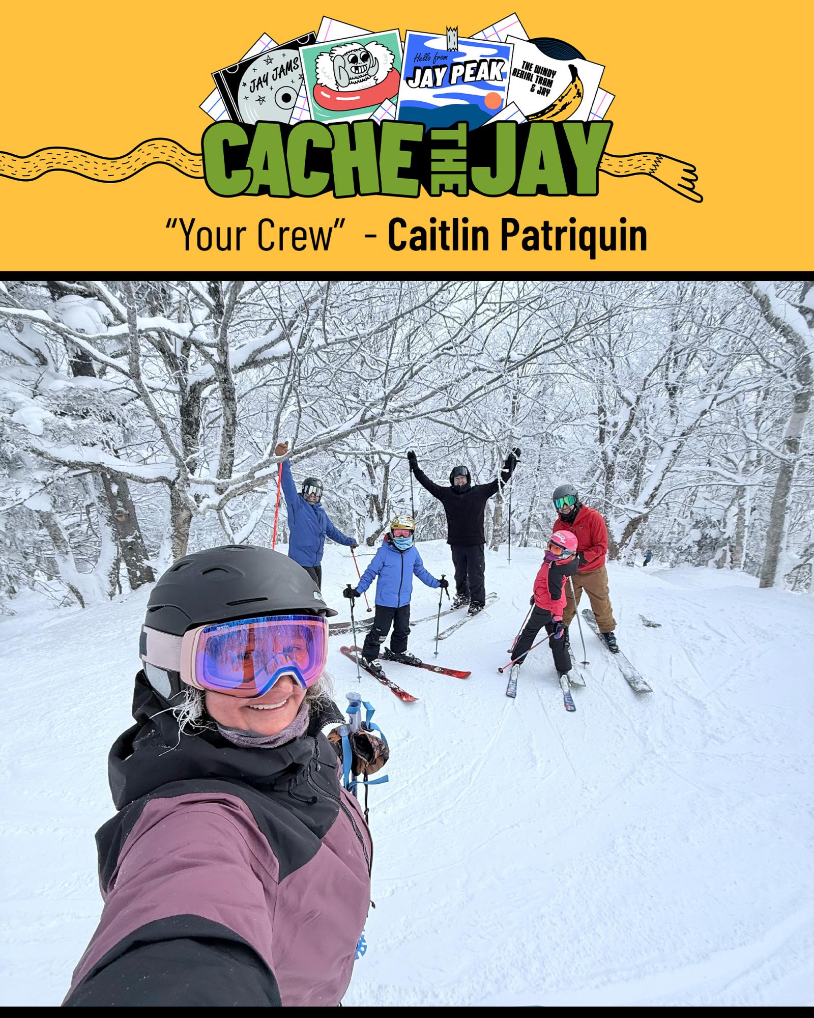Group of skiers posing in snowy forest, smiling at the camera.